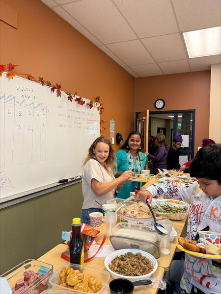 Teachers and students enjoying a shared meal after their culminating lesson on equity and anti-racism.