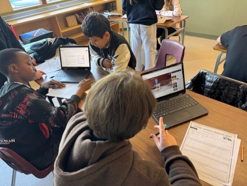 Students actively engaged in building to test Hydraulics 