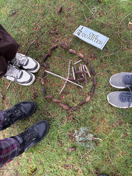 Grade 6 students practicing fractions outside.