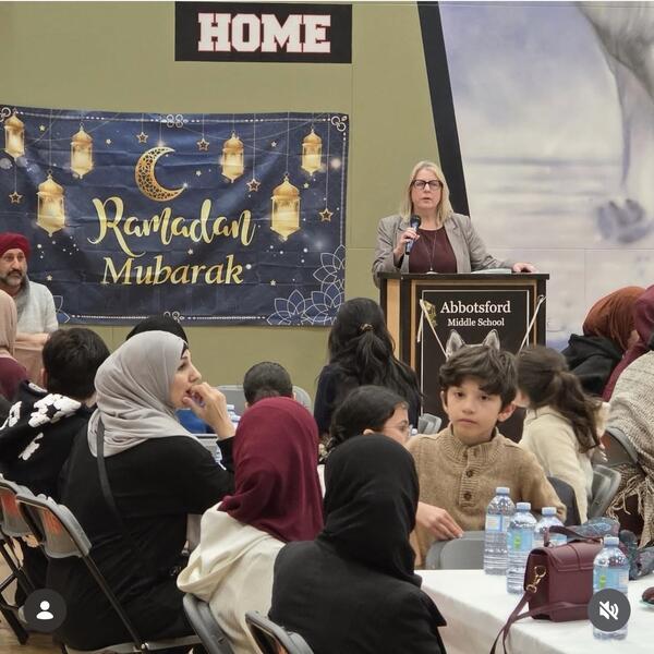 Assistant superintendent, Lisa Burdeyny speaking at an Iftar dinner for our Abby Middle Muslim community.